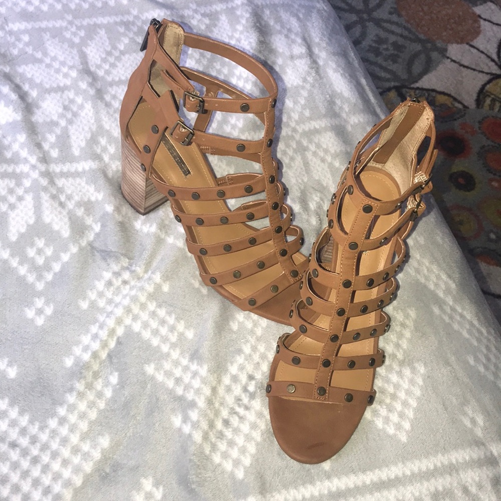 Brown strappy pumps.